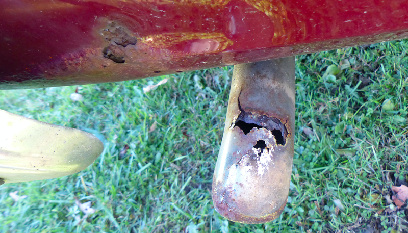 Rust hole in the tailpipe.